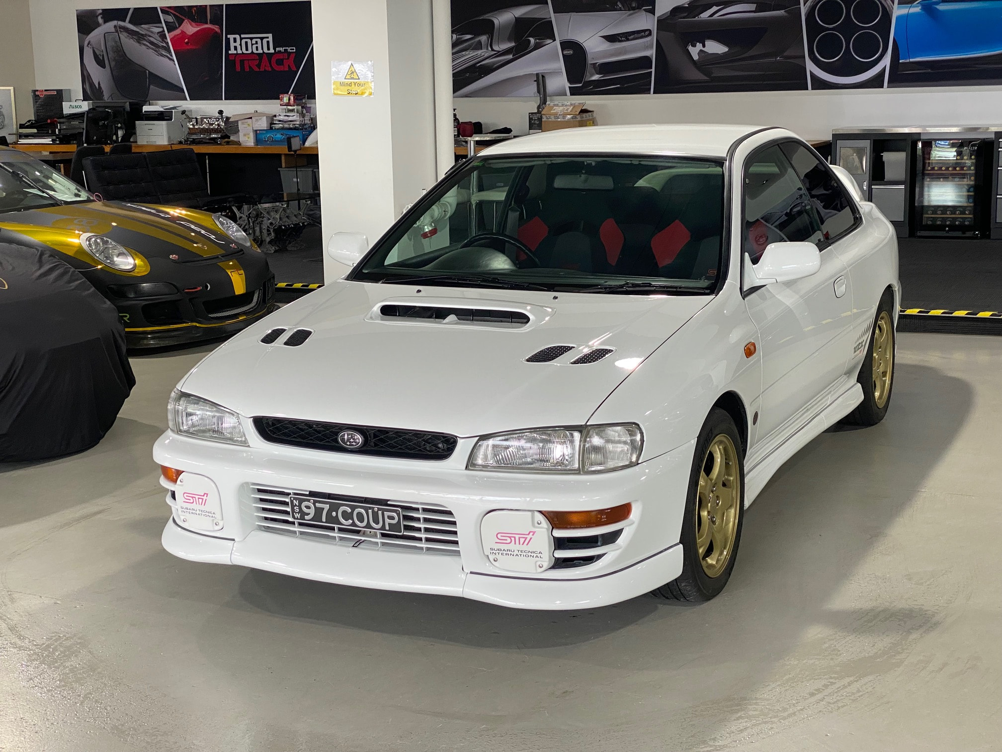 おまけ4枚目 SUBARU インプレッサ WRX タイプR STI 1997年 Iconic Auctioneers | 1997 Subaru Impreza WRX STi Type R